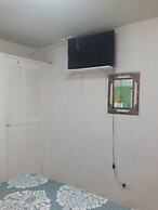 Room in Guest Room - Green Sea Inn in the San Luis Sector