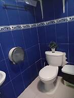 Room in Guest Room - Green Sea Inn in the San Luis Sector