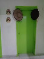 Room in Guest Room - Green Sea Inn in the San Luis Sector