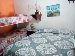 Room in Guest Room - Green Sea Inn in the San Luis Sector