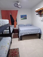 Room in Guest Room - Green Sea Inn in the San Luis Sector