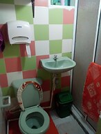 Room in Guest Room - Green Sea Inn in the San Luis Sector