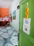 Room in Guest Room - Green Sea Inn in the San Luis Sector