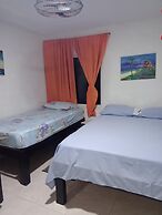 Room in Guest Room - Posada Green Sea San Luis Pesos With Breakfast In