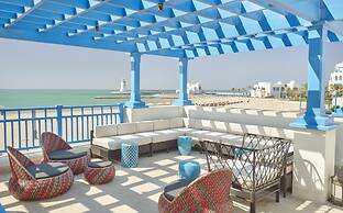 Hilton Salwa Beach Resort & Villas