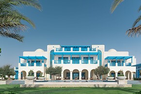 Hilton Salwa Beach Resort & Villas
