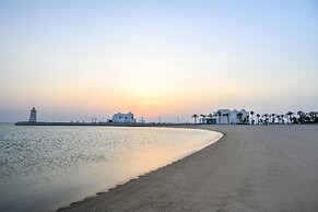 Hilton Salwa Beach Resort & Villas
