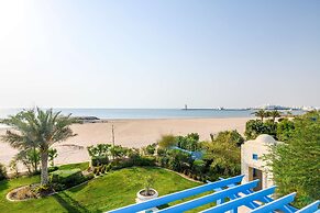 Hilton Salwa Beach Resort & Villas