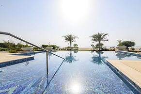 Hilton Salwa Beach Resort & Villas