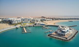 Hilton Salwa Beach Resort & Villas