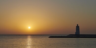 Hilton Salwa Beach Resort & Villas