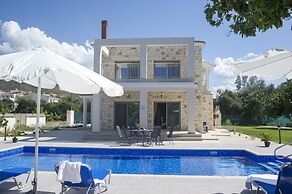 Stunning new Beach Front Villa,1st Line to the Beach, Large Pool, Wond