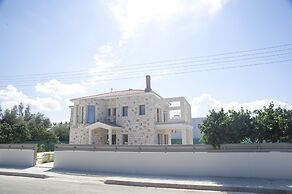 Stunning new Beach Front Villa,1st Line to the Beach, Large Pool, Wond