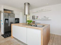 Modern Holiday Home in Brovst with Hot Tub