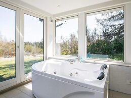 Modern Holiday Home in Brovst with Hot Tub