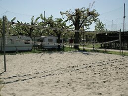 Wooden Chalet with Terrace near Beach