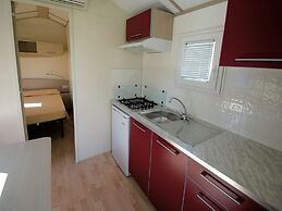 Wooden Chalet with Terrace near Beach