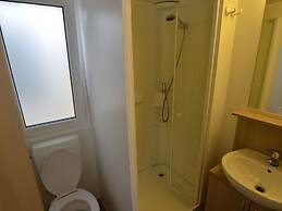 Wooden Chalet with Terrace near Beach