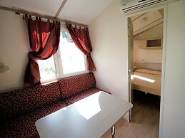 Wooden Chalet with Terrace near Beach