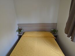 Wooden Chalet with Terrace near Beach