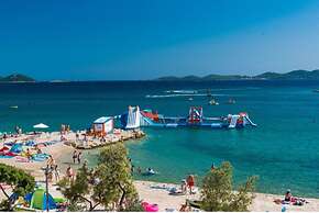 Apartment Right on the Janice Beach in Pakostane