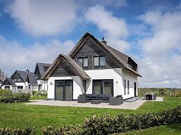Luxury Thatched Wellness Villa near Sea on Texel
