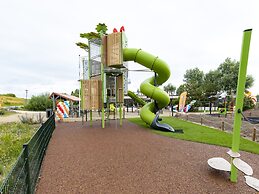 Cozy Chalet With Veranda on the Beach