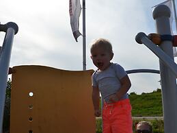 Cozy Chalet With Veranda on the Beach