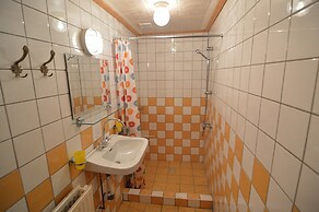 House Situated Peacefully on a Vast Green