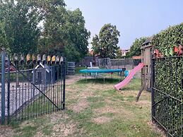House Situated Peacefully on a Vast Green