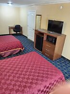 Delmonico Inn & Suites