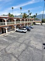 Delmonico Inn & Suites