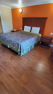 Delmonico Inn & Suites
