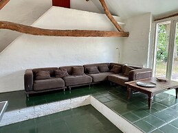 Spacious Farmhouse near Forest in Stramproy