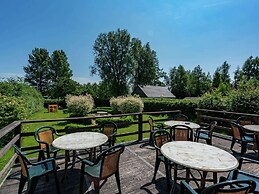 Quaint Holiday Home in Friesland by the Lake
