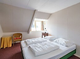Quaint Holiday Home in Friesland by the Lake
