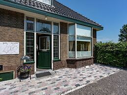 Quaint Holiday Home in Friesland by the Lake