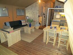 Campsite - Combined Tents With Kitchen and Bathroom Located Near a Pon