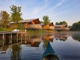 Campsite - Combined Tents With Kitchen and Bathroom Located Near a Pon