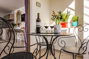 Elimia Suites & Studios