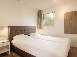 Comfortable Bungalow With Massage Shower, Within Nature