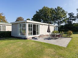 Cozy Chalet With air Conditioning and Steam Shower, at a Holiday Park 