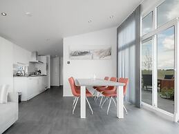 Nice Chalet with Fireplace near Oosterschelde