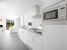 Nice Chalet with Fireplace near Oosterschelde