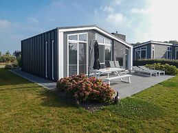 Cozy Chalet with Fireplace near Oosterschelde