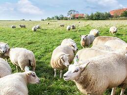 Cozy Chalet with Fireplace near Oosterschelde