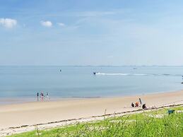 Cozy Chalet with Fireplace near Oosterschelde