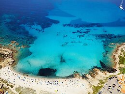 Belvilla by OYO Comfortable Apartment With Pool