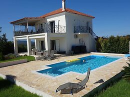 Elegant Villa in Evangelismos with Pool & Garden near Sea Beach