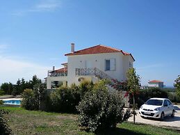 Elegant Villa in Evangelismos with Pool & Garden near Sea Beach